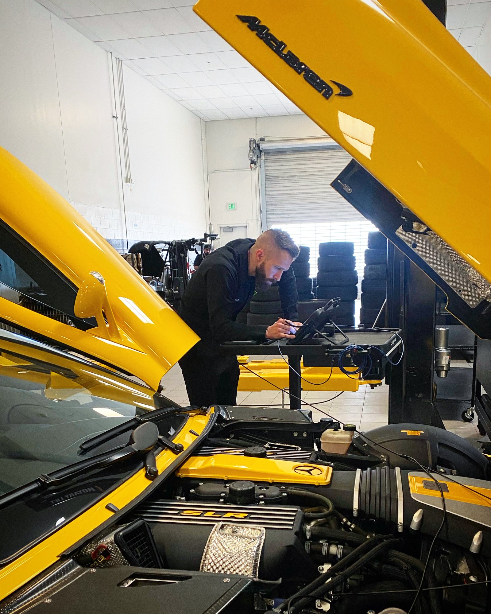 Christopher Manning diagnosing a Mercedes-Benz SLR McLaren